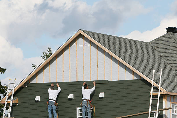 Professional Siding Installation technician working in Perry Hall, MD